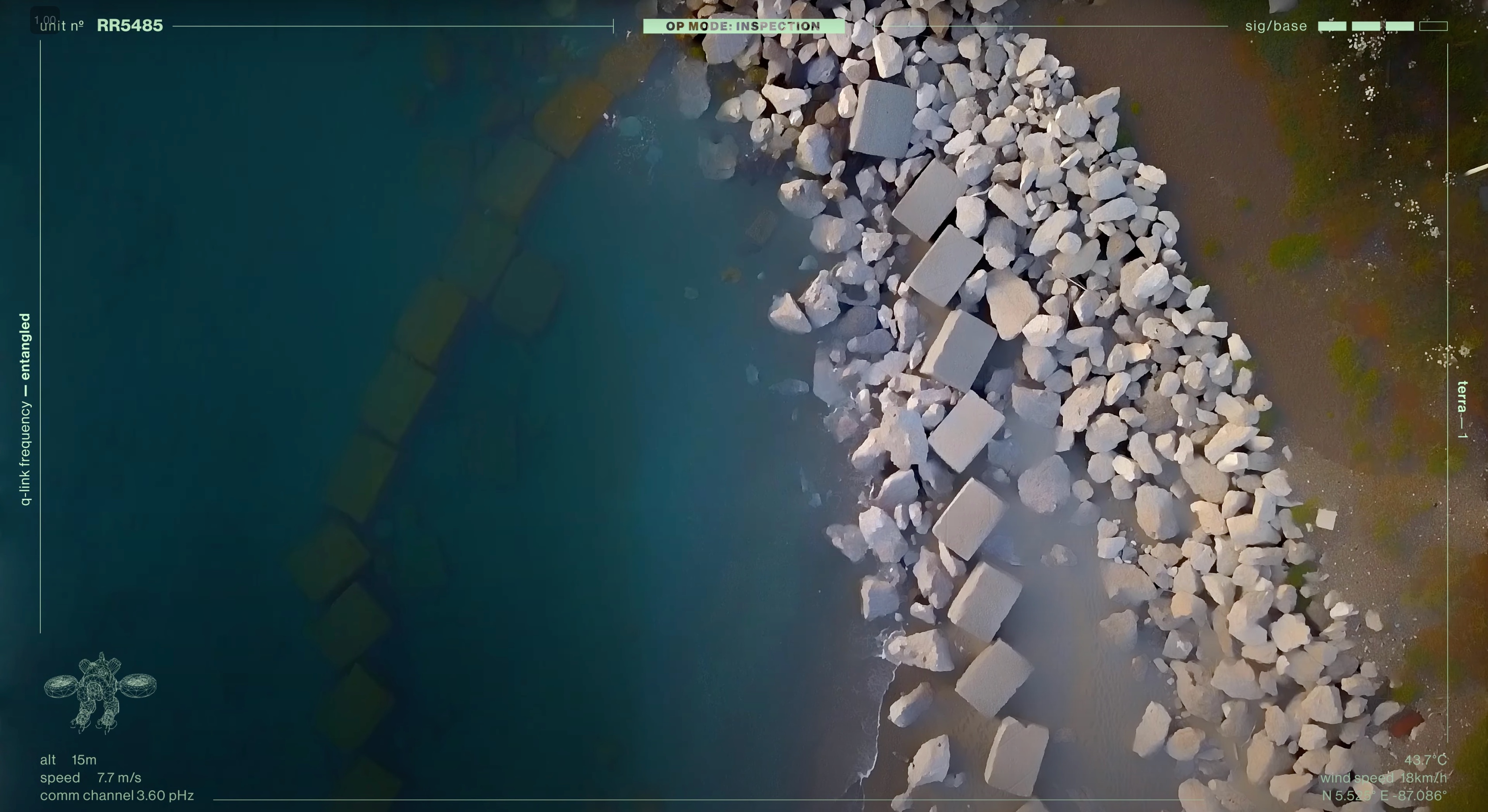 Aerial coastline scan over rocks and water