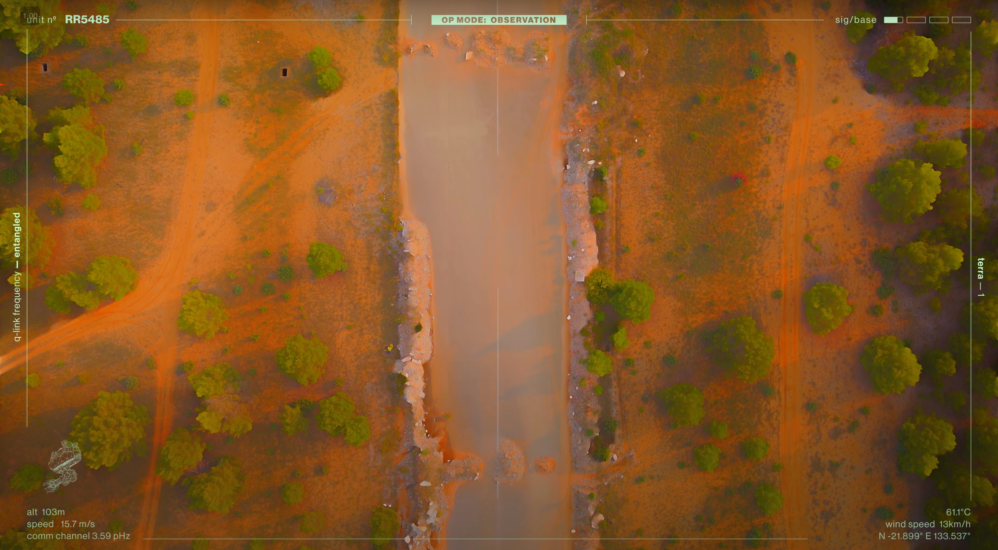 Aerial terrain observation over a red road